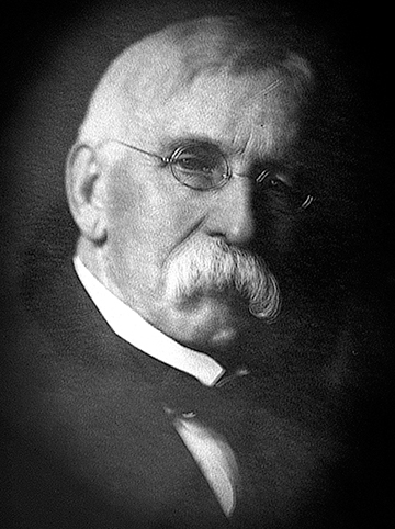 Headshot of Commissioner Powderly