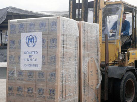 Image of A pallet of kitchen supplies, donated by the UNHCR for refugees in Sarajevo, September 18, 1996. *National Archives.